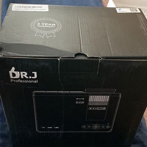 SOLD Dr. J PROFFESIONAL Projector NEW in BOX